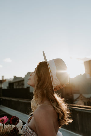 Handmade wedding hat by Remi Wylder in bone colour